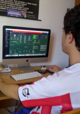 Alessandro busy leading Derry City to their latest victory during a game of 'Football Manager'.